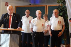 DBKV Vizepräsident Frank Ziegler<br>
bei der Abschlussveranstaltung,<br>
im Hintergrund die Schiedsrichter